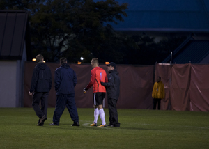 Senior Pat Castle was injured in his first career start in the 40th minute when he appeared to slip on wet grass. 