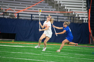 Boosted by a 20-7 advantage in the draw circle No. 4 Syracuse dominated Duke 15-8 for its second straight win. 